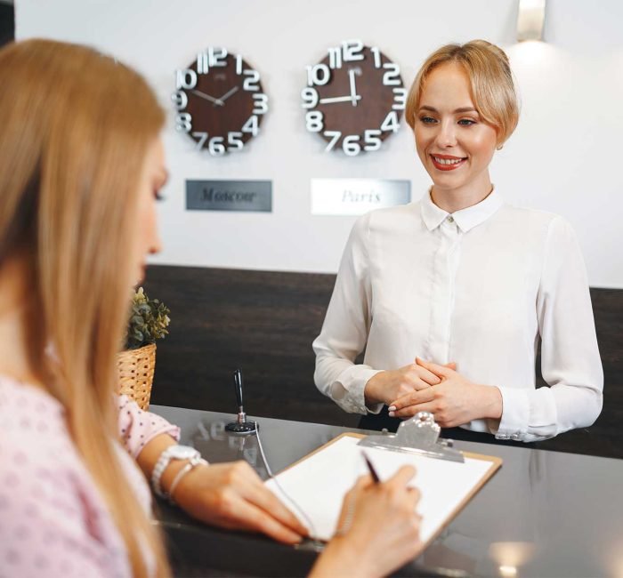 blonde-woman-hotel-guest-checking-in-at-front-desk-2021-09-03-05-46-20-utc.jpg blonde-woman-hotel-guest-checking-in-at-front-desk-2021-09-03-05-46-20-utc.jpg